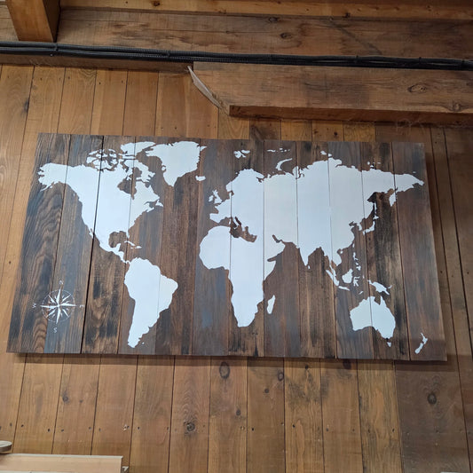 Actual one-off 60 by 34 inch painted wood world map from The Attic, front view